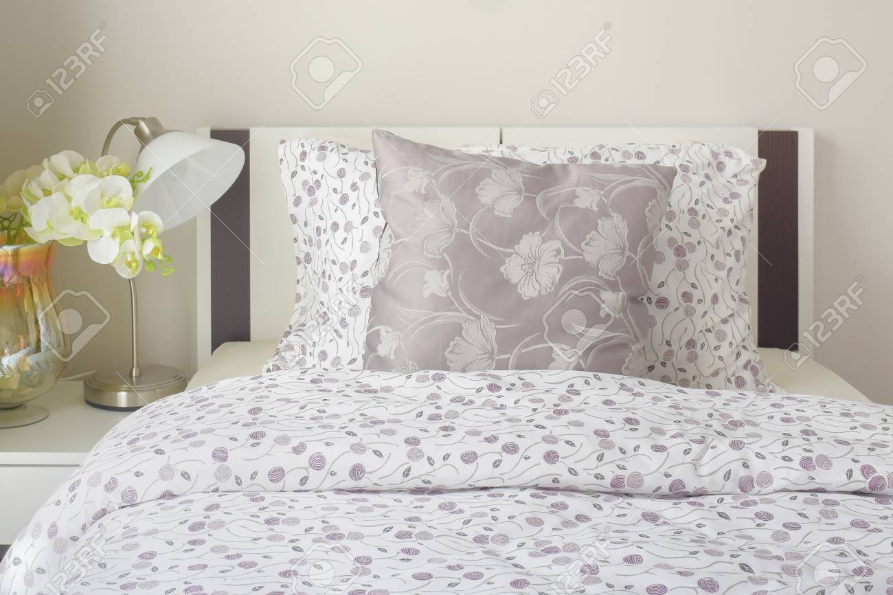 Tiny Lavender Pattern Style Bedding In Bedroom With White Orchid