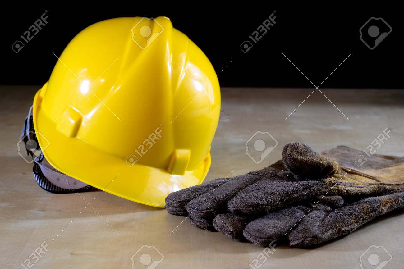 Download Yellow Helmet Safety Goggles And Work Gloves For The Worker Stock Photo Picture And Royalty Free Image Image 85323546 PSD Mockup Templates