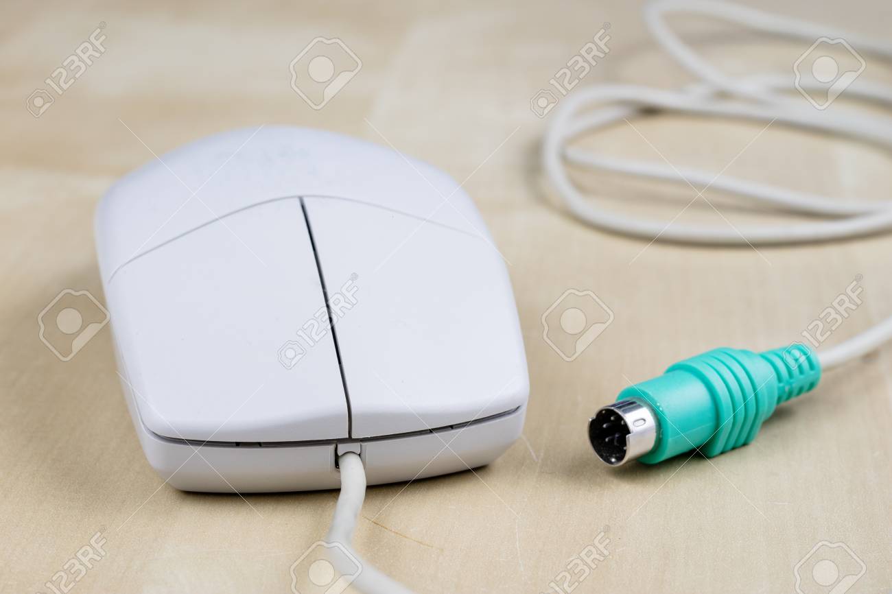 Old Computer Mouse Running On The 
