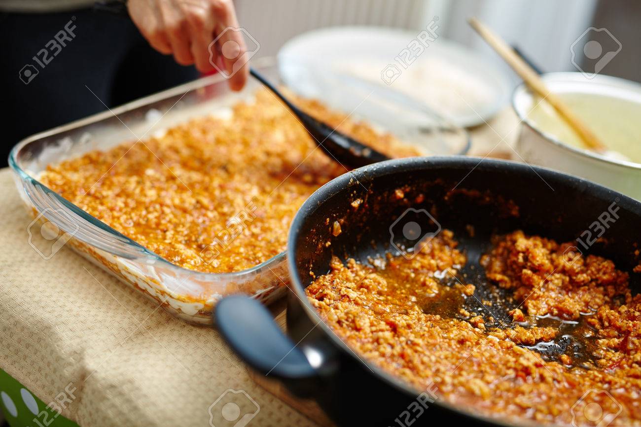 Cooking Lasagna Putting Grind Meat Recipe Filling In The Tray Stock Photo Cooking Lasagna Putting Grind Meat Recipe Filling In The Tray Stock Photo