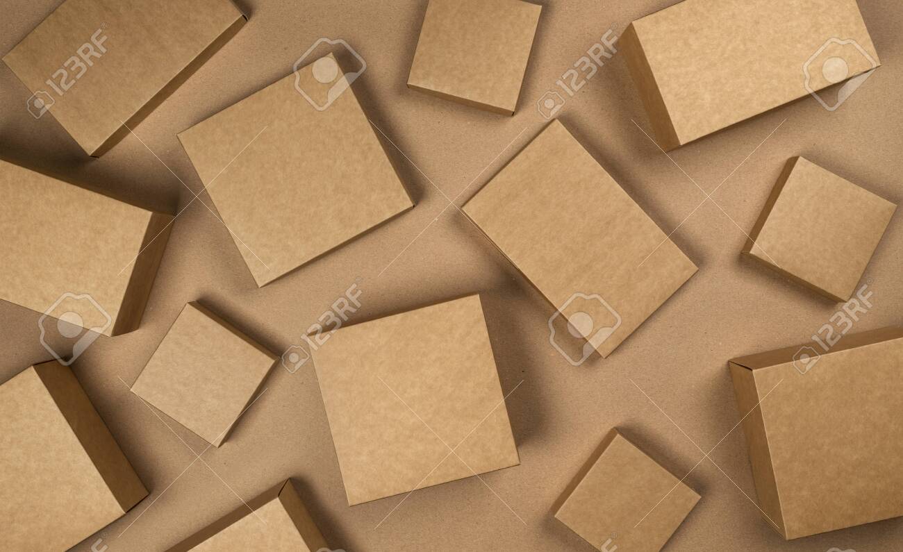 Download Blank Brown Cardboard Boxes On Craft Paper Background Top View Stock Photo Picture And Royalty Free Image Image 141391379