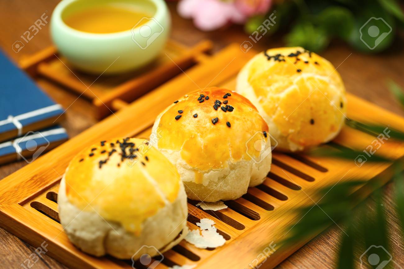 egg yolk puff and tea on bamboo plate - 90372686 egg yolk puff and tea on bamboo plate - 90372686