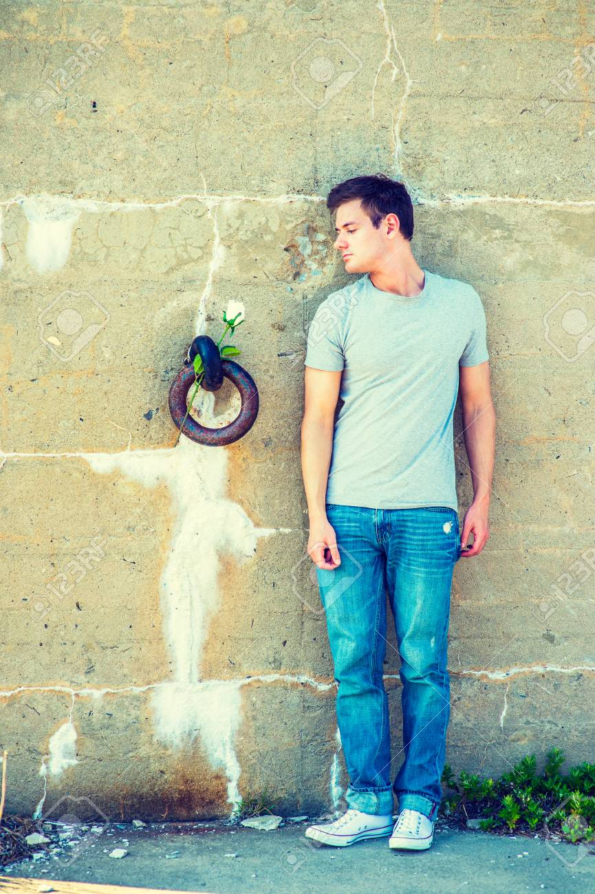 Man Missing You Wearing Gray T Shirt Blue Jeans White Sneakers A Young Handsome Guy Is Man Missing You Wearing Gray T Shirt Blue Jeans White Sneakers A Young Handsome Guy Is
