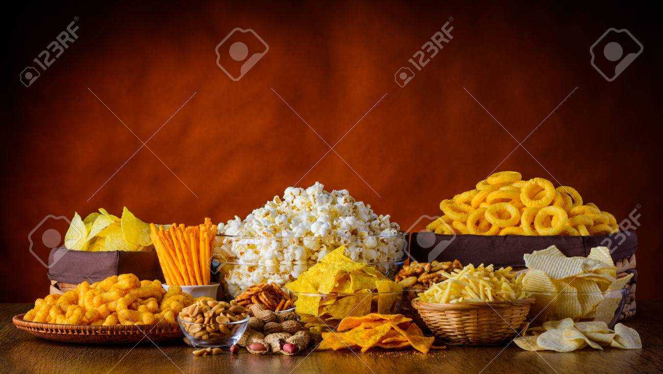 Different Types Of Snacks Chips Nuts And Popcorn In Still Life Stock Photo Picture And Royalty Free Image Image 50930656