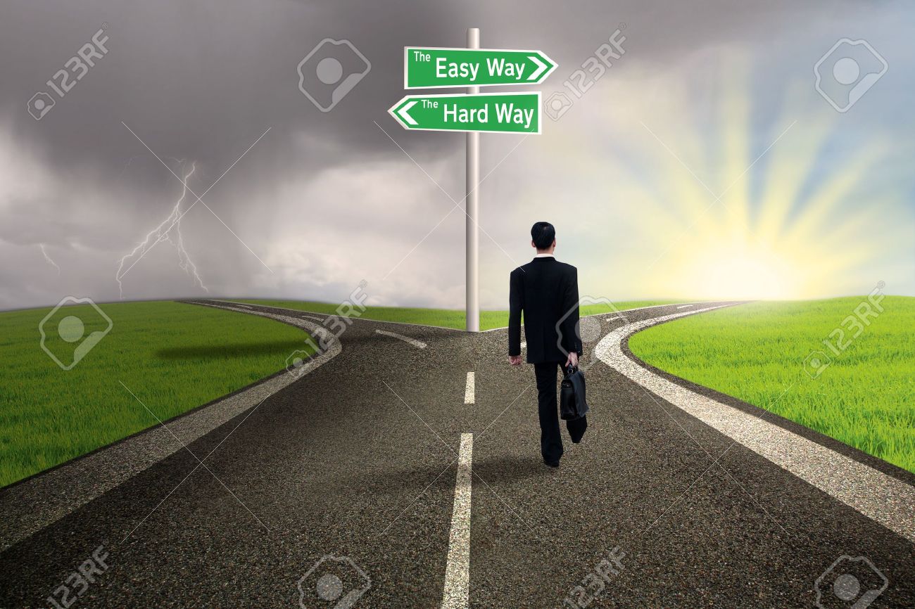 Businessman is walking on the easy way lane with stormy background - 17533497 Businessman is walking on the easy way lane with stormy background - 17533497