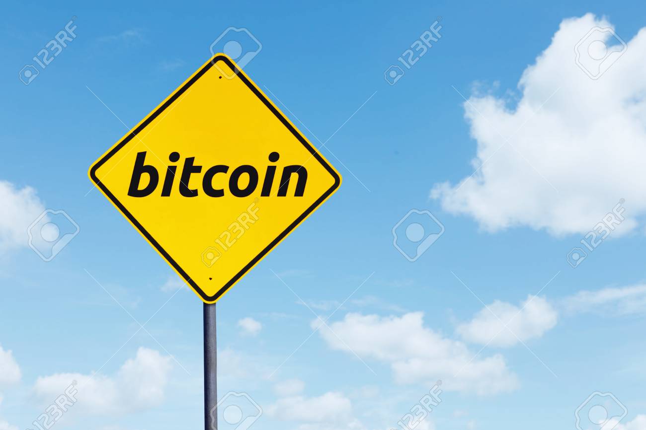Image Of Yellow Signboard With Bitcoin Word Under Blue Sky Stock Photo,  Picture and Royalty Free Image. Image 96444931.