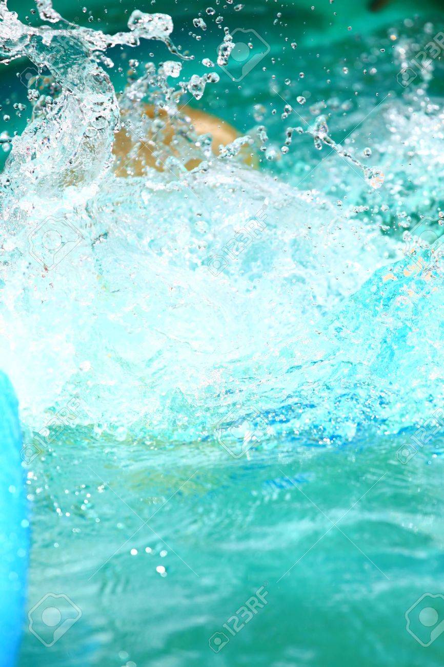 Pool Water Splash water splash in a blue pool stock photo, picture and royalty free Pool Water Splash water splash in a blue pool stock photo, picture and royalty free