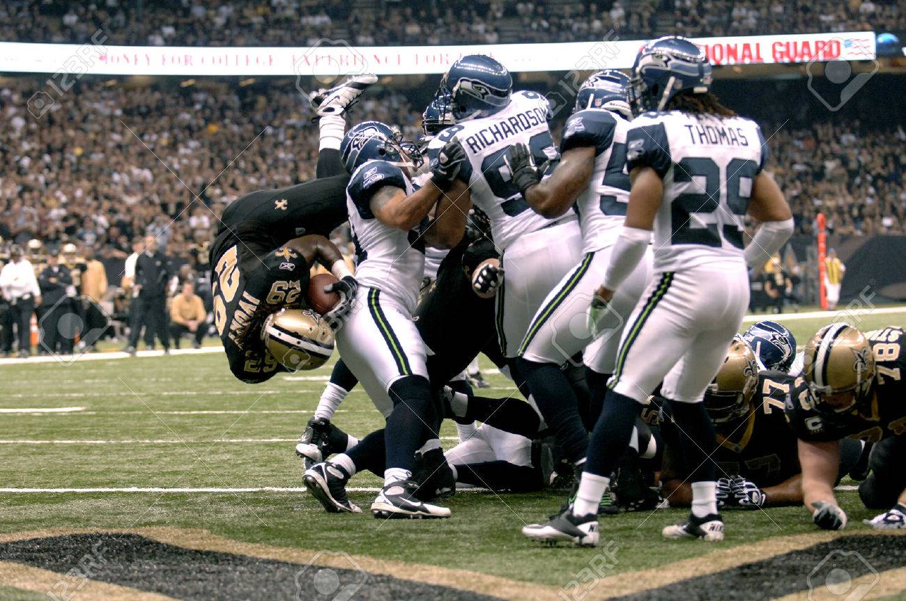 chris ivory of the new orleans saints dives over the seattle stock