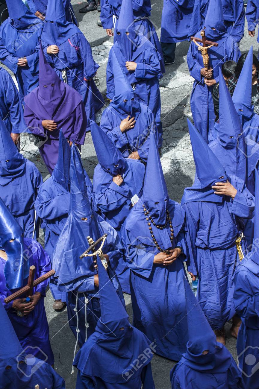 Quito, Ecuador - April 6, 2012: Catholic procession dressed in penitential robes with tall hoods to disguise their identity on Good Friday to remember the death of Jesus Christ, parading through the streets of the Old town. Holy Week (Semana Santa) is on - 90208138 Quito, Ecuador - April 6, 2012: Catholic procession dressed in penitential robes with tall hoods to disguise their identity on Good Friday to remember the death of Jesus Christ, parading through the streets of the Old town. Holy Week (Semana Santa) is on - 90208138