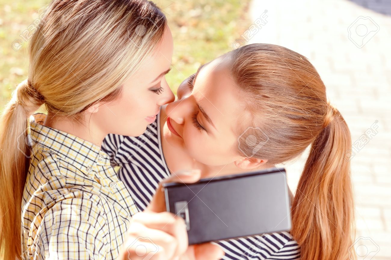 Free Love. Top View Of Lesbian Couple Doing Selfie In Green Park. Stock  Photo, Picture and Royalty Free Image. Image 43437186.