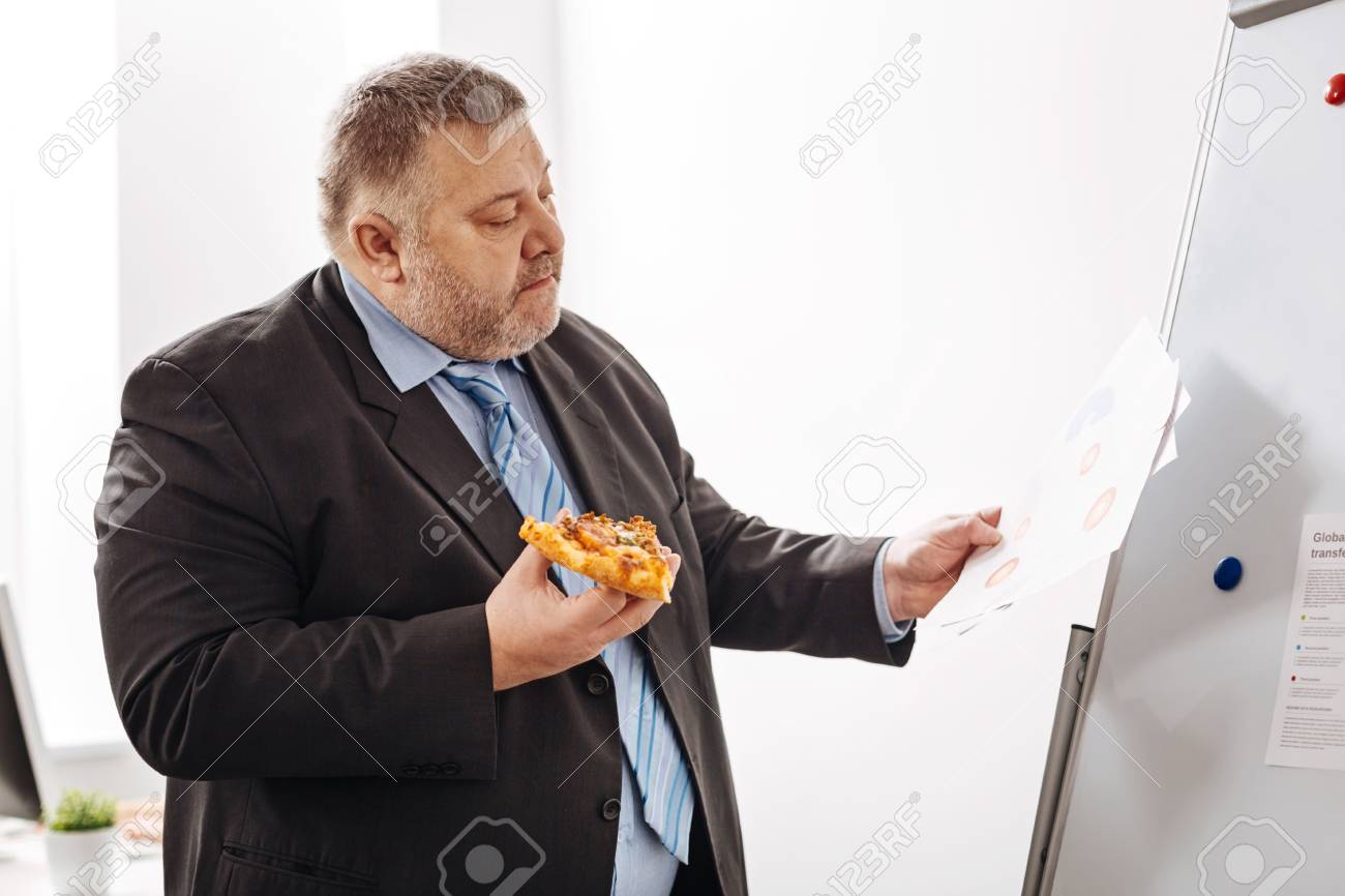 hardworking business employee having a snack stock photo picture hard working employee