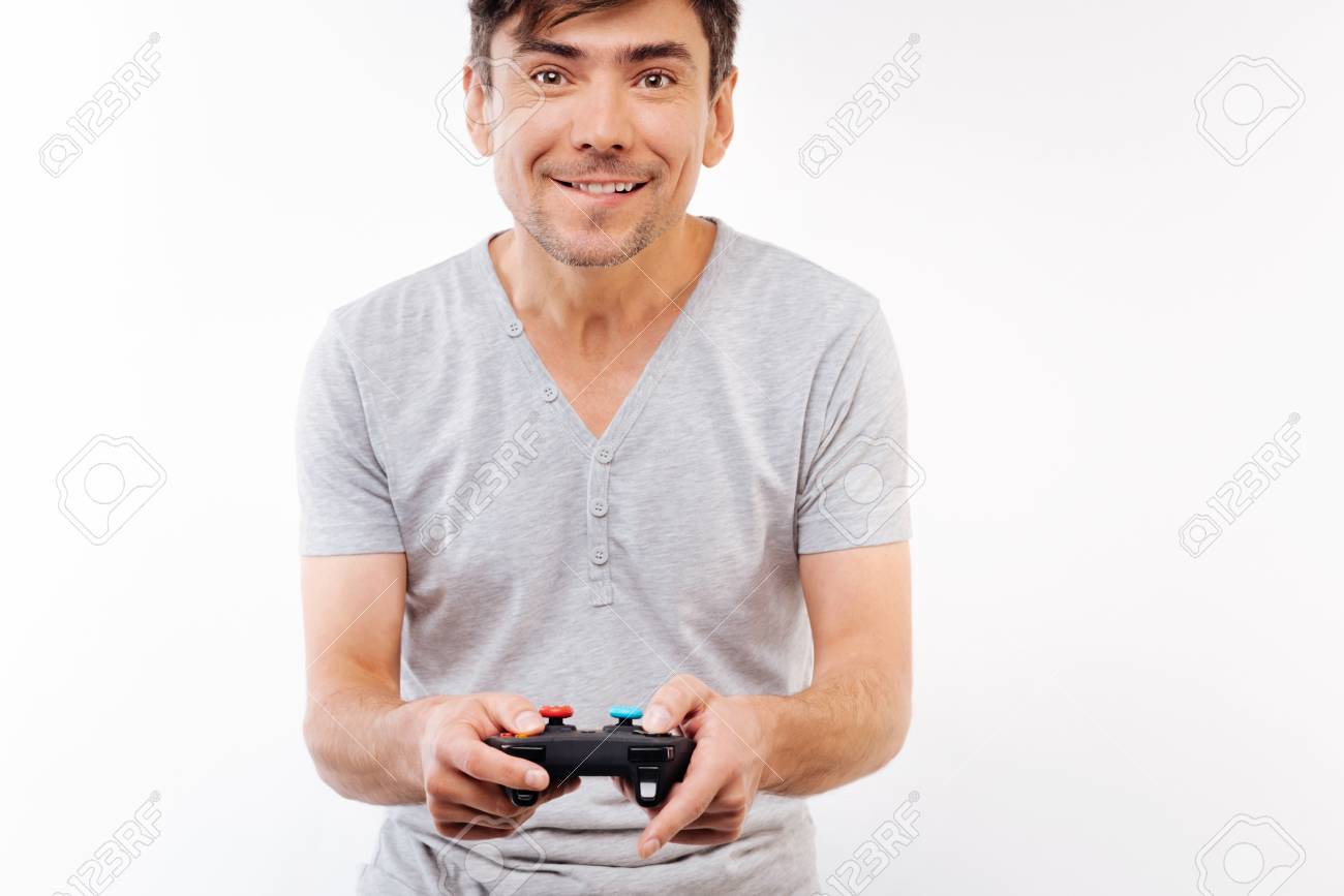 Free Photo  Person playing video games with controller on