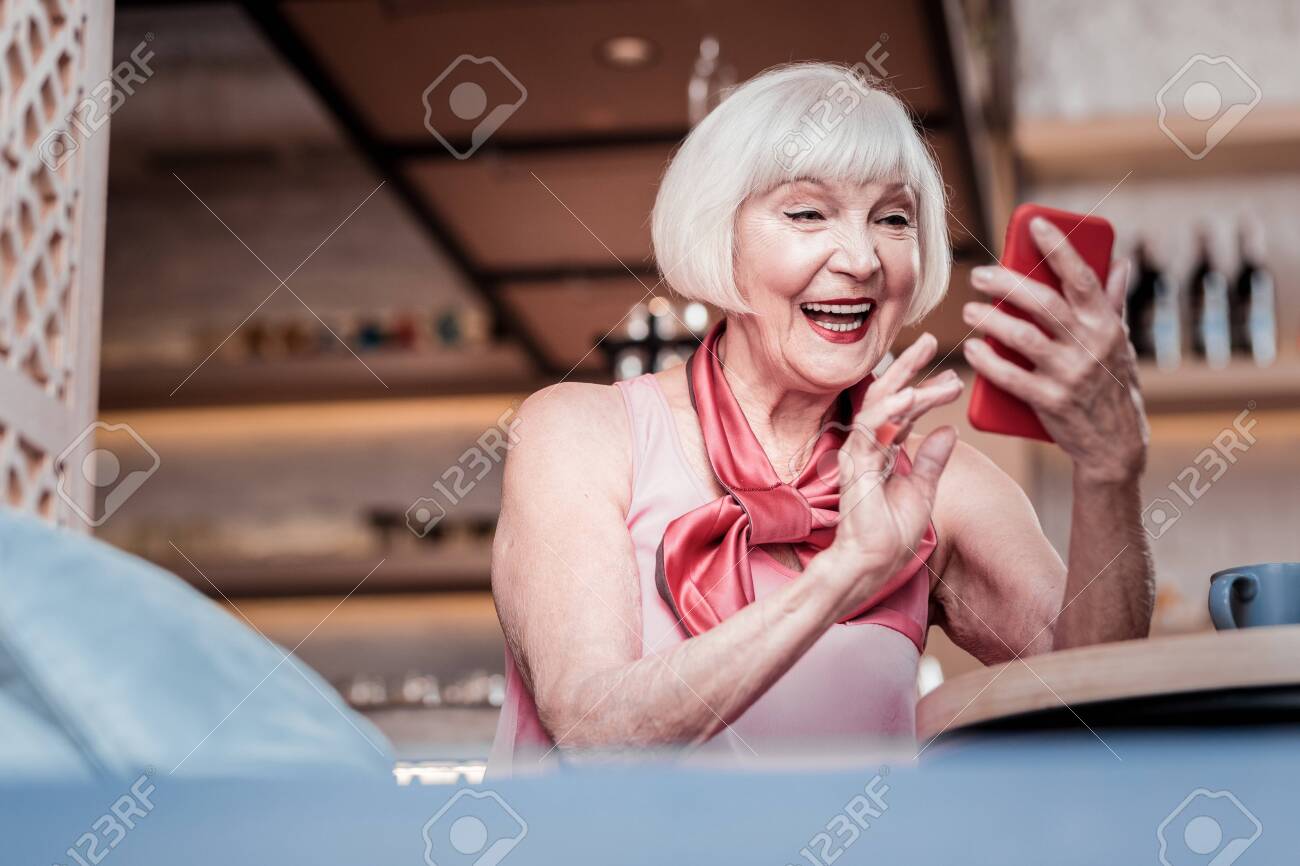 Cheerful Good Looking Senior Excited Old Lady With Bob Haircut
