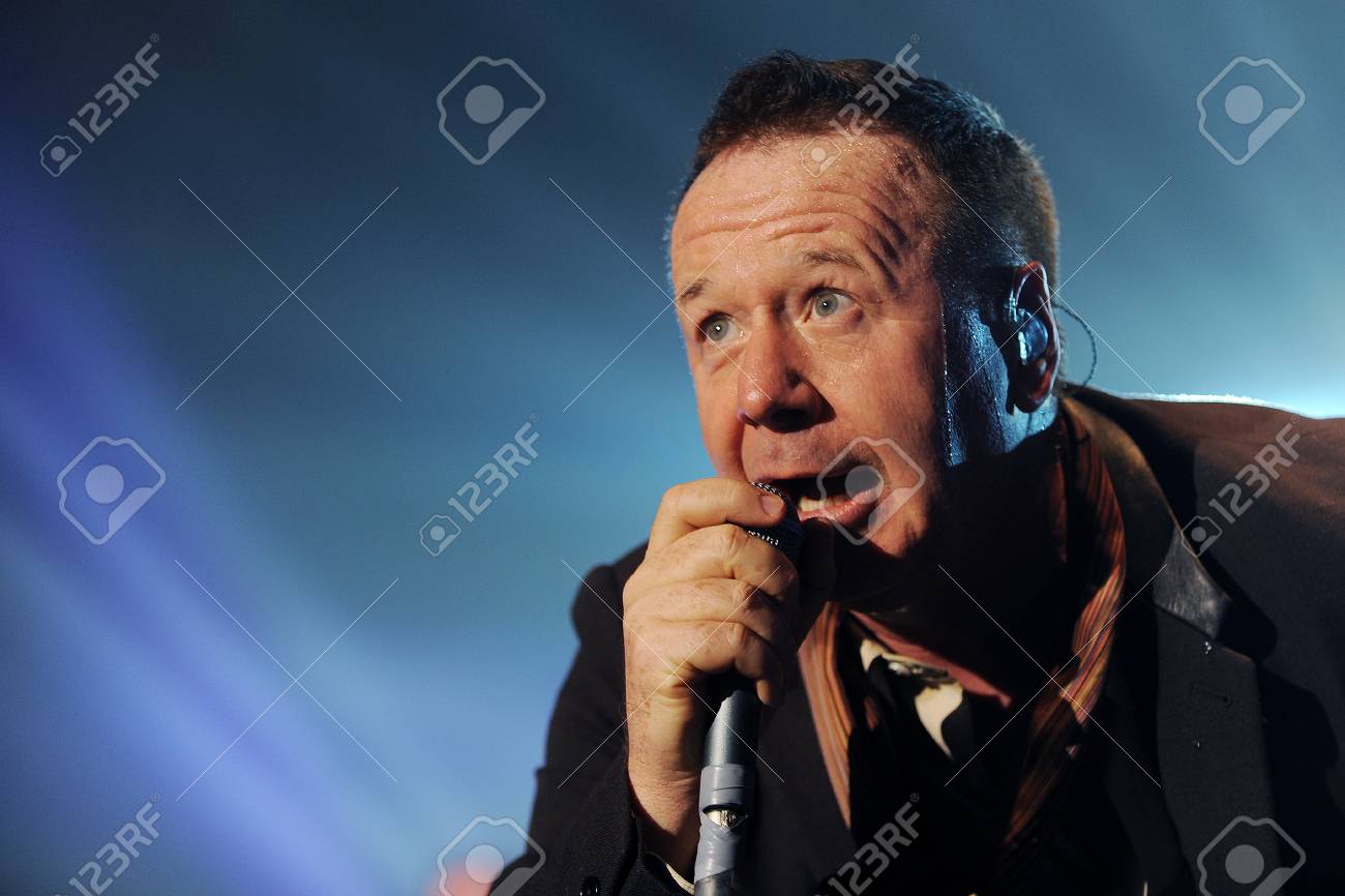 PRAGUE, CZECH REPUBLIC - FEBRUARY 28, 2014: Singer James Kerr Of Simple Minds During A Performance In Prague, Czech Republic, February 28, 2014. Stock Photo, Picture and Royalty Free Image. Image 73808671.