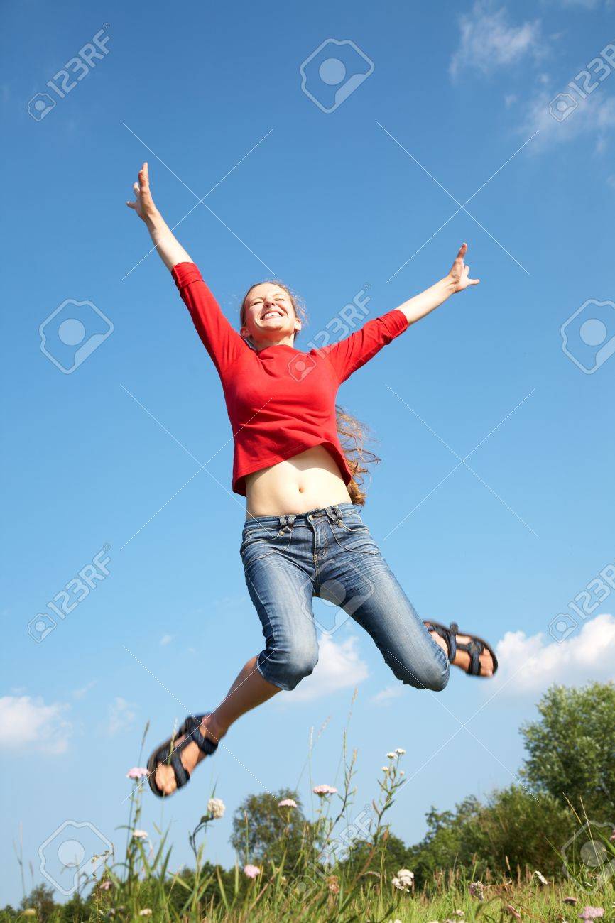 Summer Woman Jumping Of Joy Excited On Nature Background Stock Photo,  Picture And Royalty Free Image. Image 10430533.