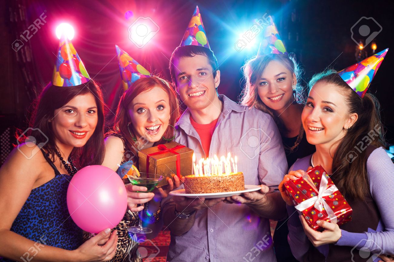 group of young people on birthday party - 52892516 group of young people on birthday party - 52892516