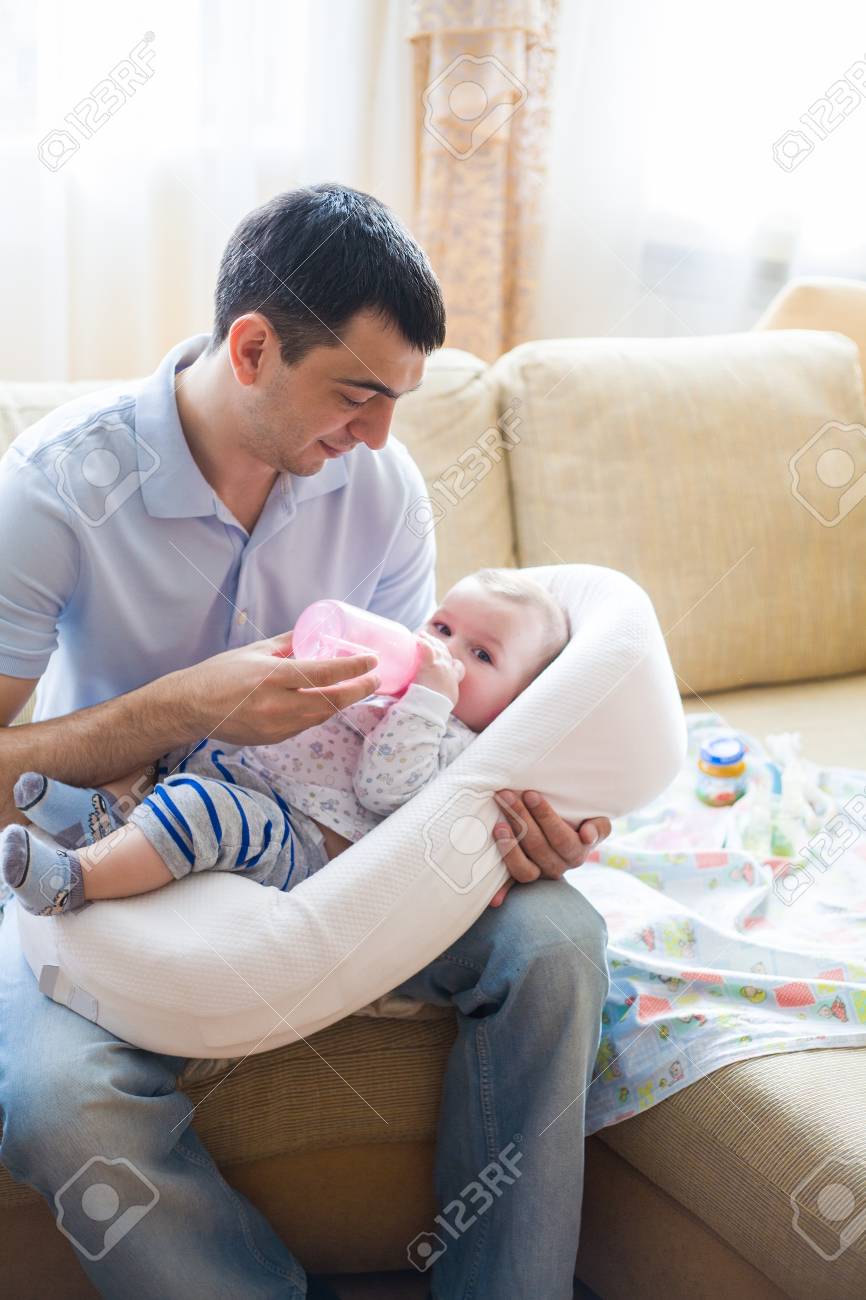 Happy Dad Feeding Baby Bottle Stock Photo Picture And Royalty Free Image Image Happy Dad Feeding Baby Bottle Stock Photo Picture And Royalty Free Image Image