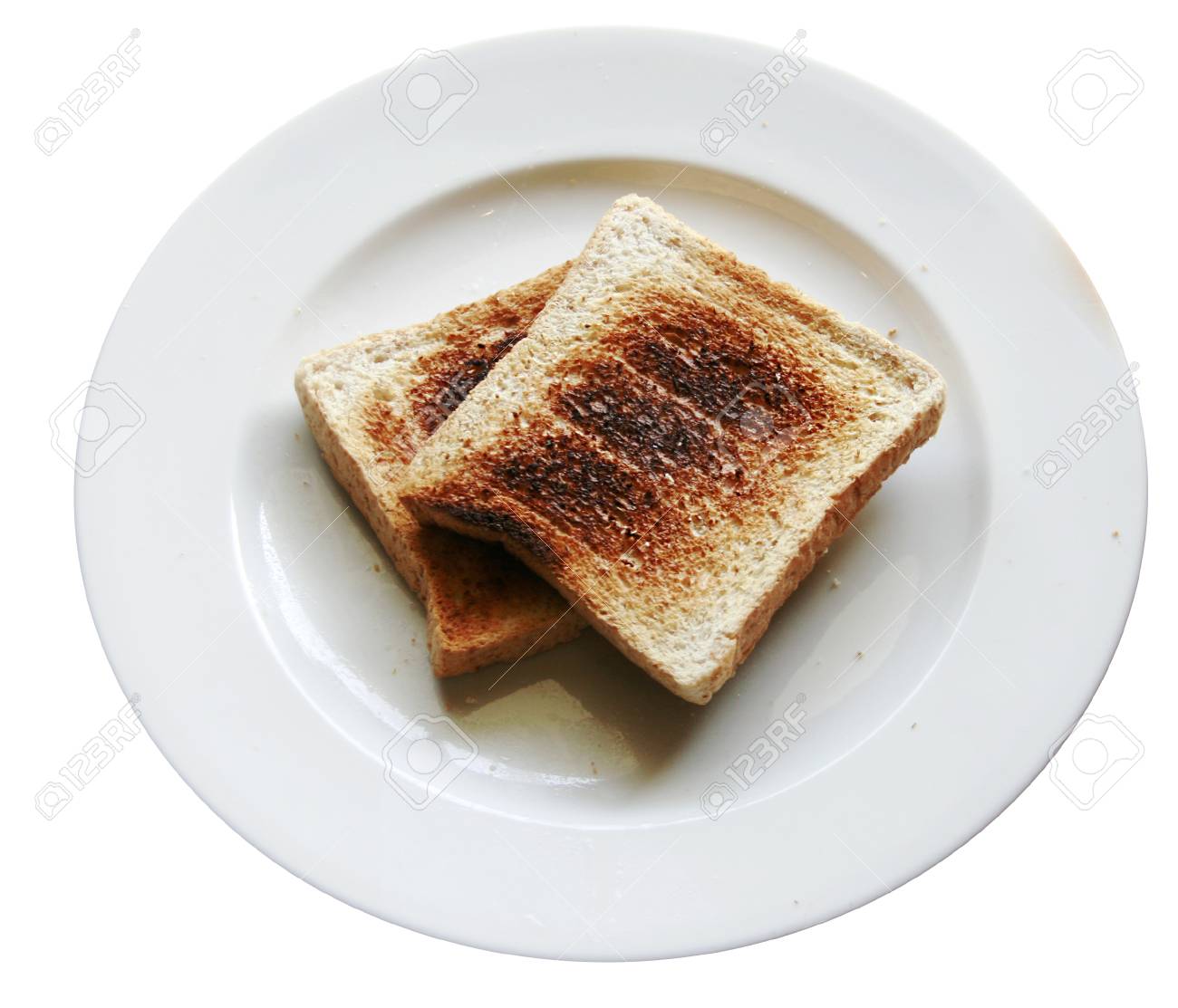 白 Backround で免震皿 トーストを焦がしてしまったパンのスライス の写真素材 画像素材 Image
