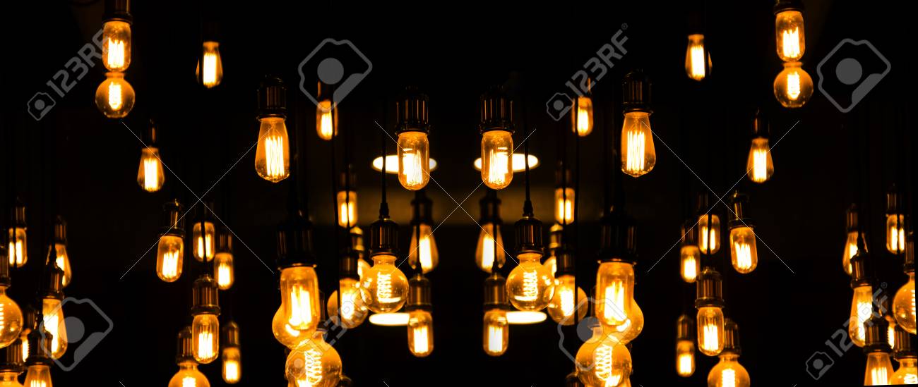 デコの暗い背景でタングステン ライト チューブ の写真素材 画像素材 Image