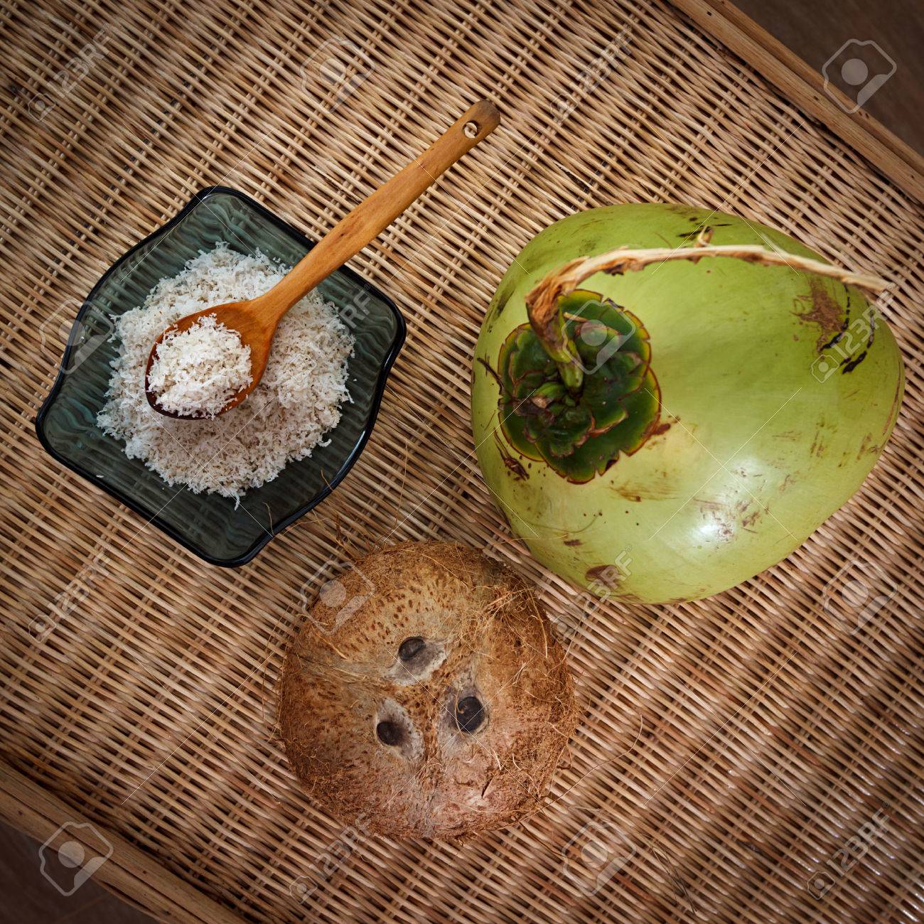 Young And Old Coconuts With Bowl Full Of Coconut Flakes On Table Top View Stock Photo Picture And Royalty Free Image Image 72677142