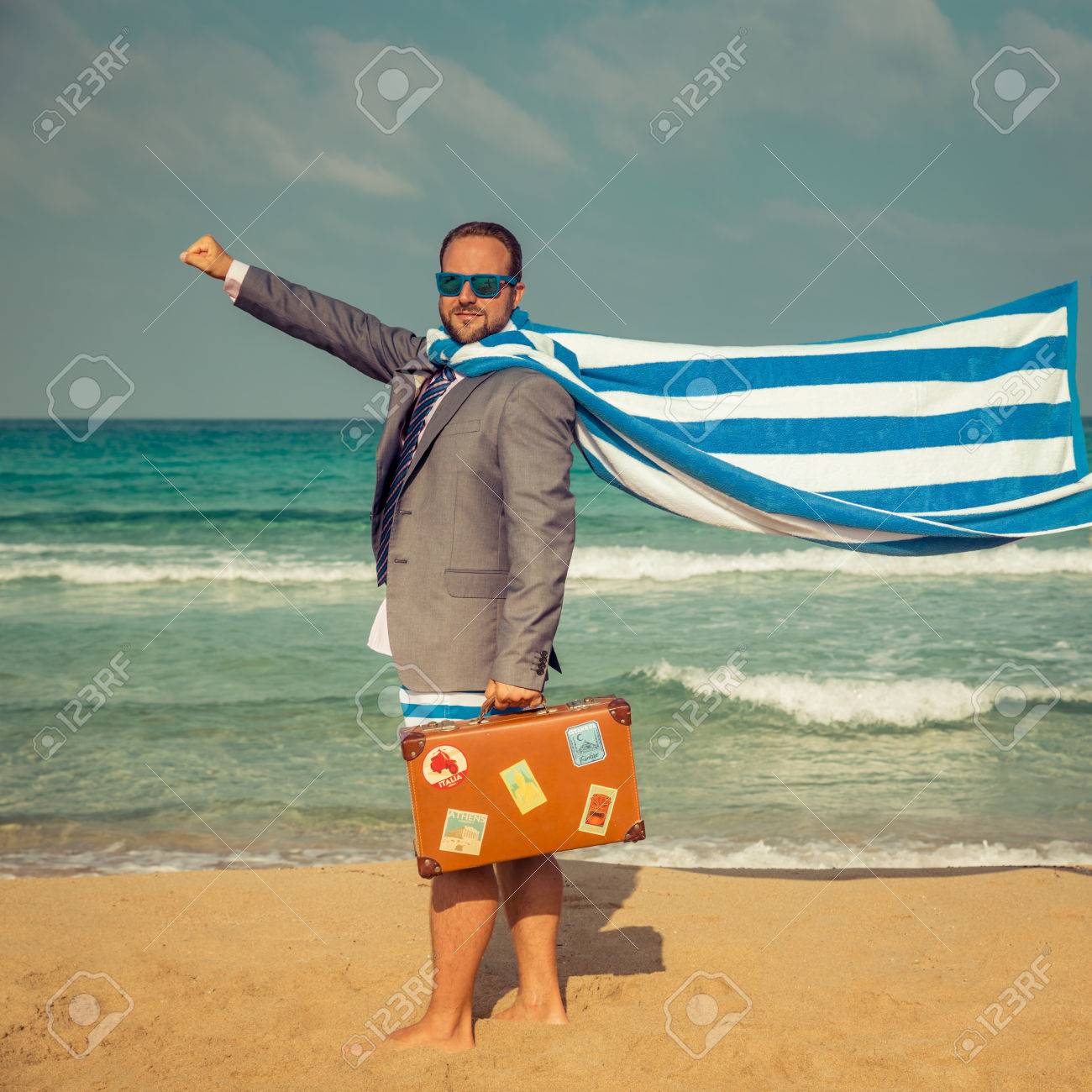 56268773-portrait-of-funny-businessman-on-the-beach-man-having-fun-by-the-sea-summer-vacation-and-travel-conc.jpg