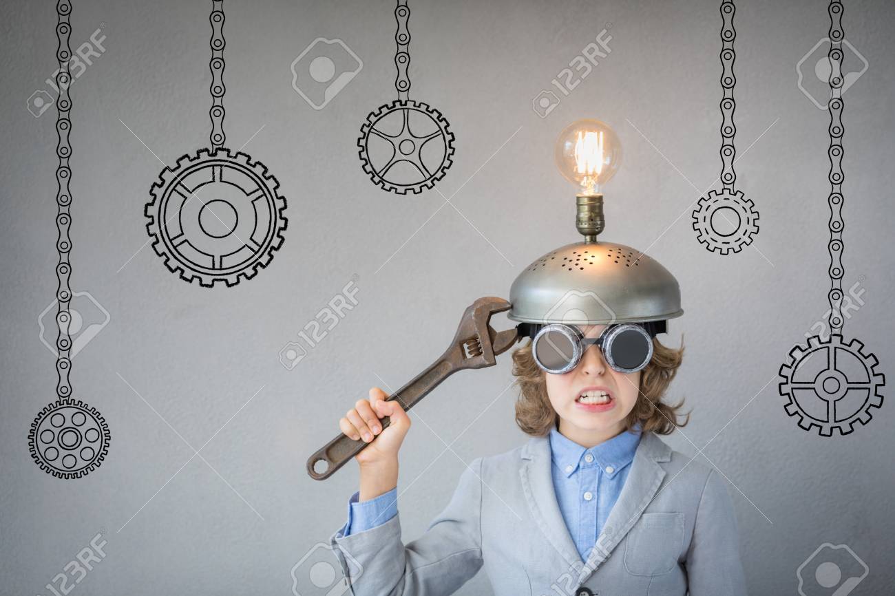 Smart kid in classroom. Child with toy virtual reality headset in class. Success, idea and creative concept. Back to school - 85566605 Smart kid in classroom. Child with toy virtual reality headset in class. Success, idea and creative concept. Back to school - 85566605