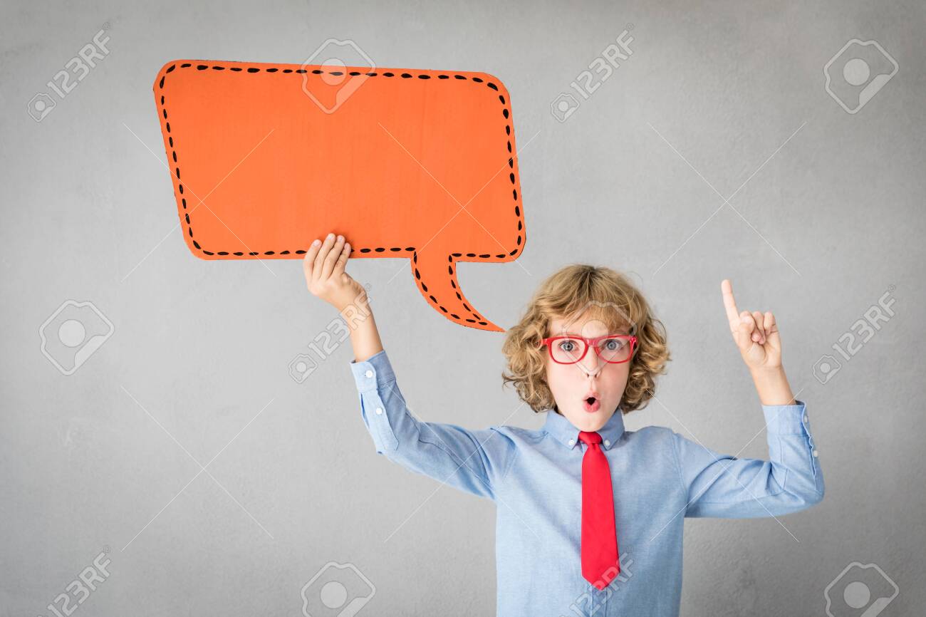 Happy child holding paper speech bubble blank. Success, creative and idea concept - 116468455 Happy child holding paper speech bubble blank. Success, creative and idea concept - 116468455