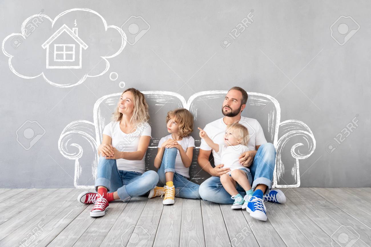 Happy family with two kids playing into new home. Father, mother and children having fun together. Moving house day and real estate concept - 119706105 Happy family with two kids playing into new home. Father, mother and children having fun together. Moving house day and real estate concept - 119706105