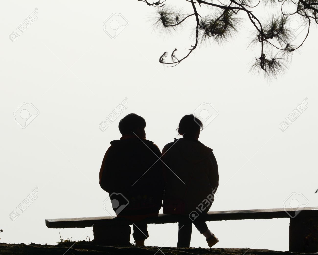 couple silhouette sitting