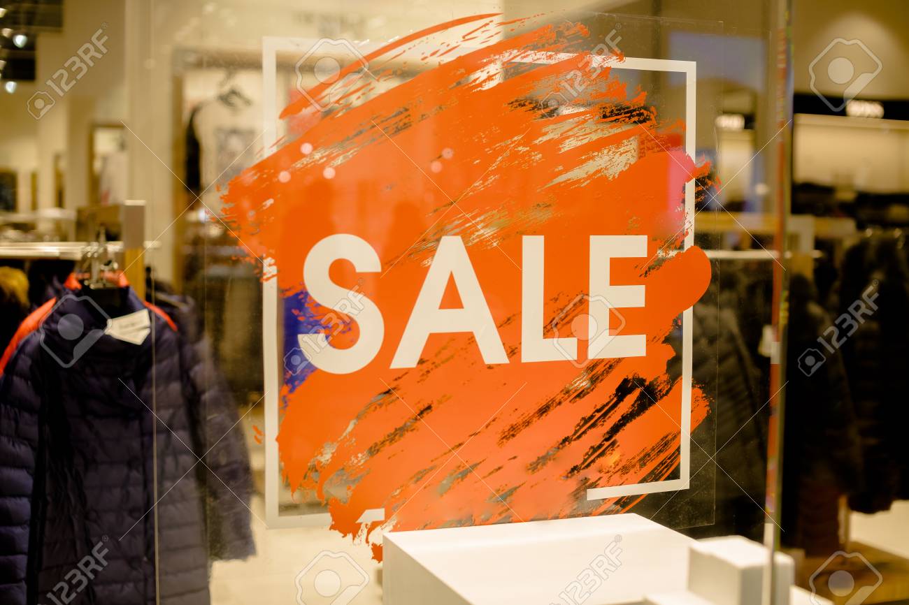 sale sign on the shops window display discount sign on show window window sale sign