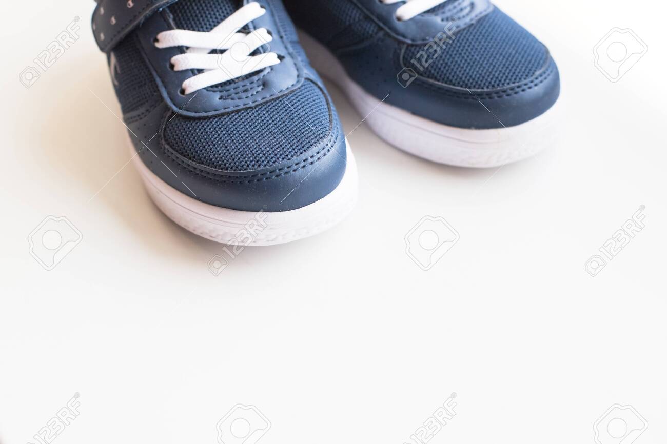 white sports shoes kids