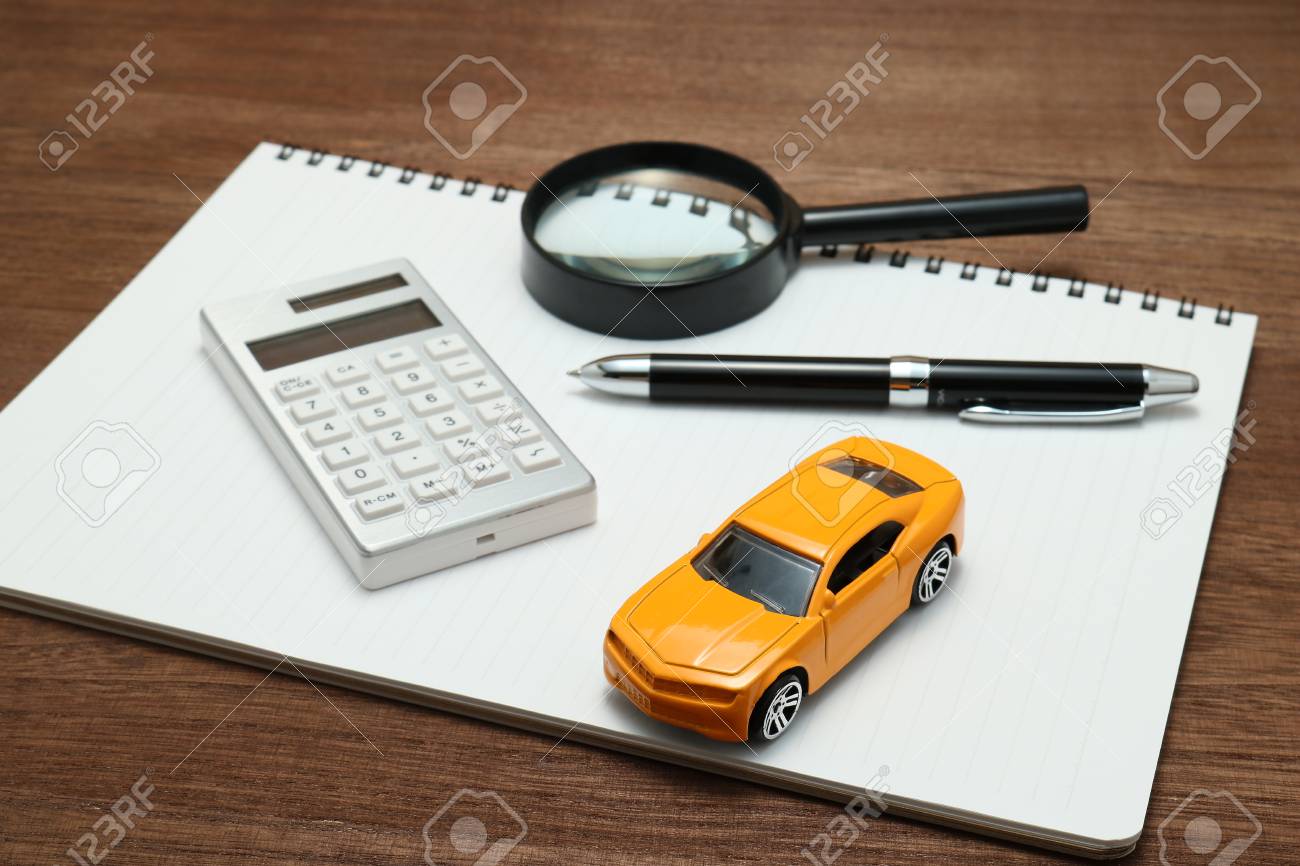 toy car magnifying glass calculator pen and notebook rent buy car calculator