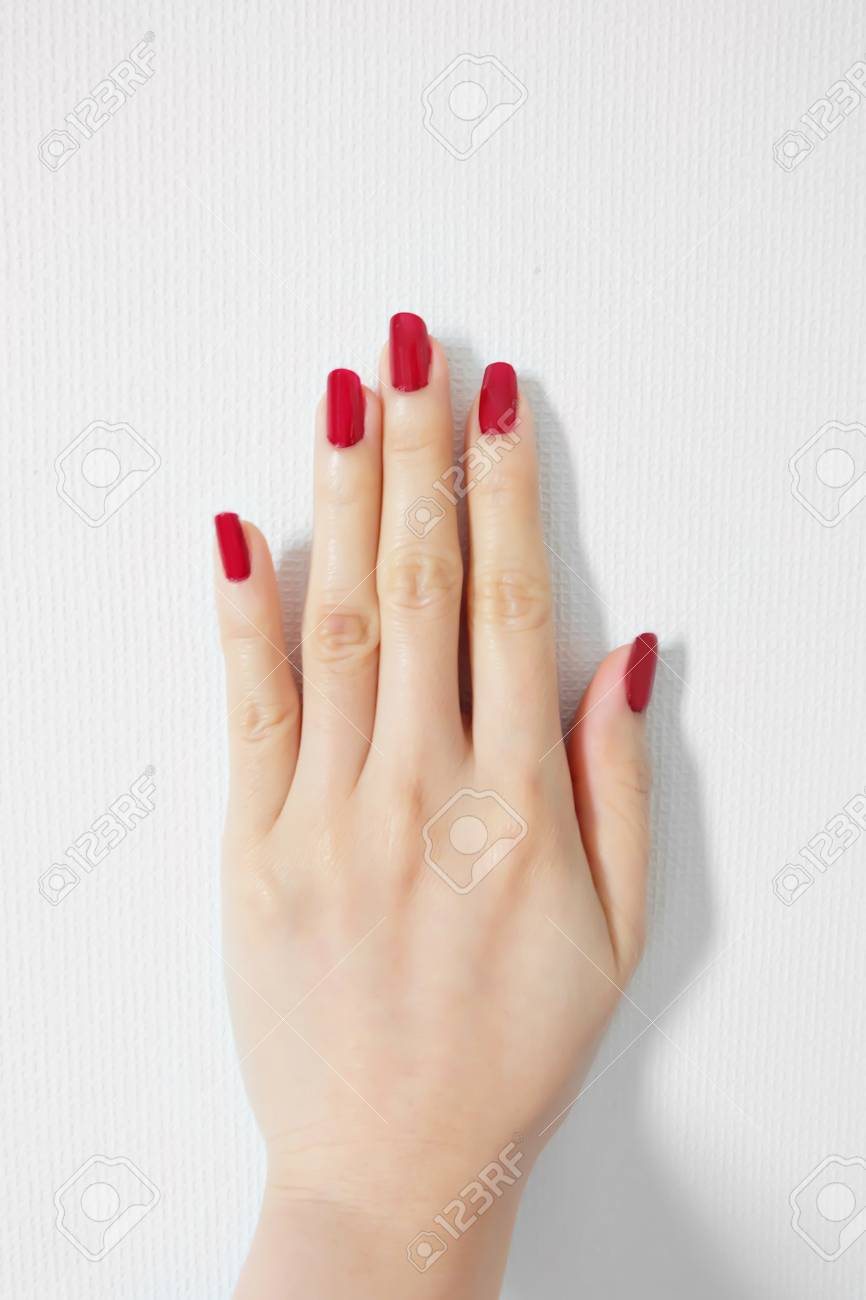 Beautiful Woman Red Nail. Female Hand With Red Nails Manicure ...