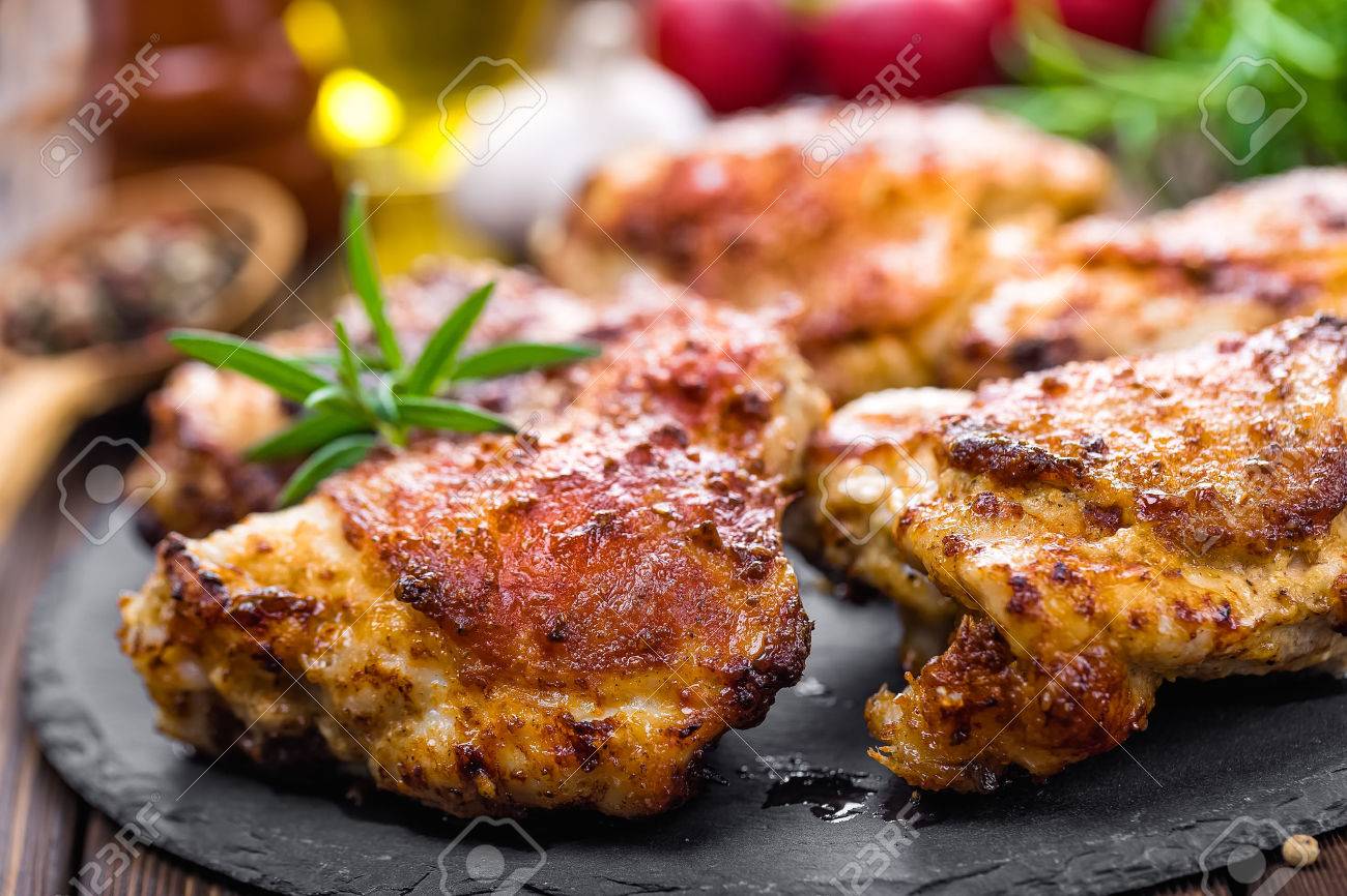 grilled chicken thighs prepared on wooden table - 54805340 grilled chicken thighs prepared on wooden table - 54805340