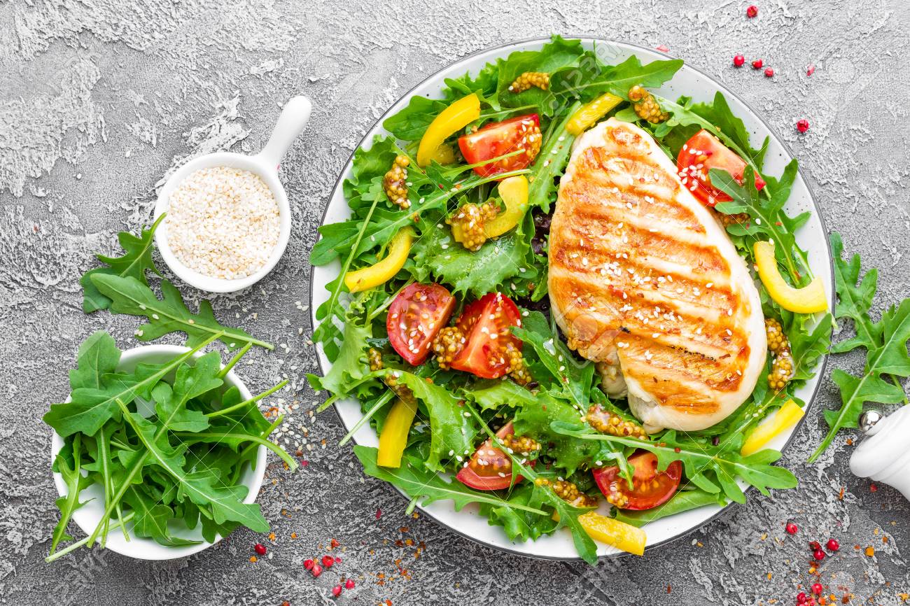 Chicken Salad Meat Salad With Fresh Tomato Sweet Pepper Arugula Stock Photo Picture And Royalty Free Image Image 102569417