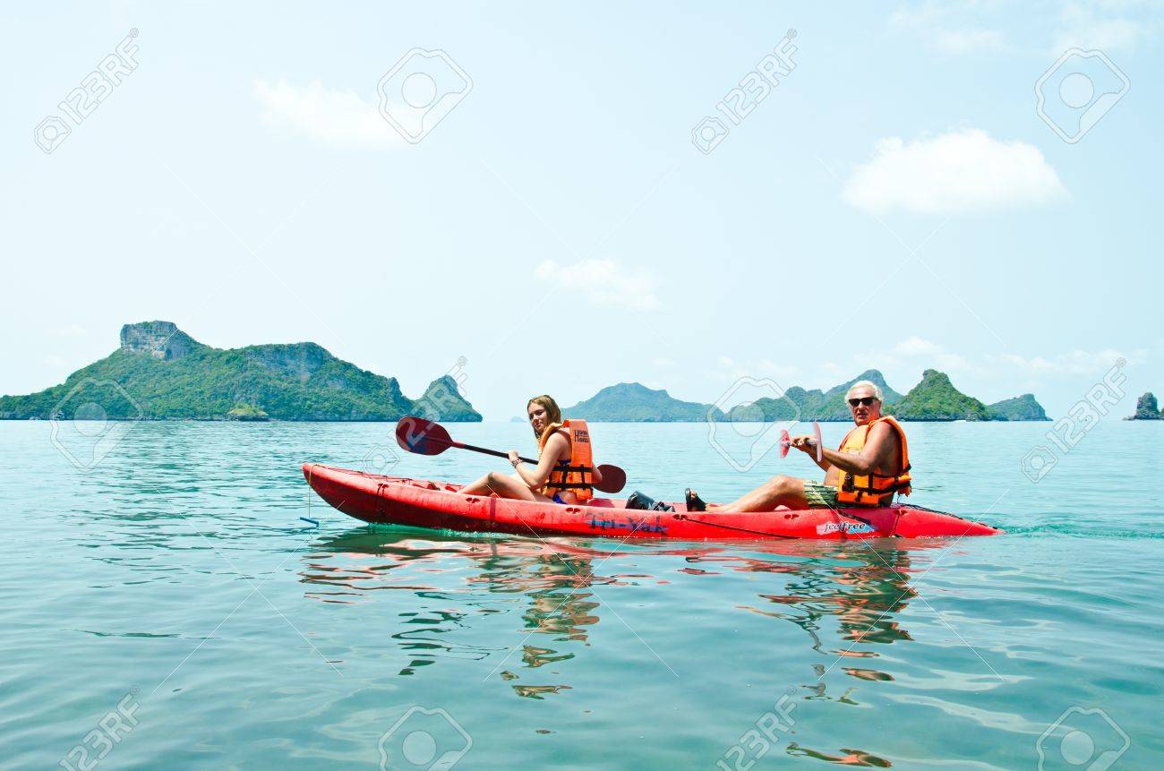 Traveler kayaking in the Gulf of Thailand. Angthong National Marine Park, Suratthani province, Thailand. - 13365150 Traveler kayaking in the Gulf of Thailand. Angthong National Marine Park, Suratthani province, Thailand. - 13365150