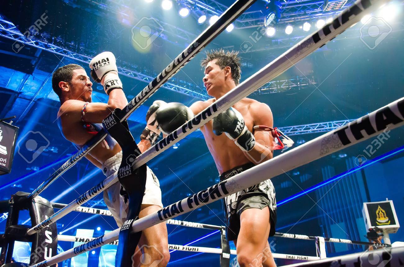 BANGKOK - JUNE 29 : Peemai Jitmuangnon of Thailand and Youssef Boughanem of Belgium at Thai Fight Extreme 2013 on June 29, 2013 in Bangkok, Thailand. - 20552973 BANGKOK - JUNE 29 : Peemai Jitmuangnon of Thailand and Youssef Boughanem of Belgium at Thai Fight Extreme 2013 on June 29, 2013 in Bangkok, Thailand. - 20552973