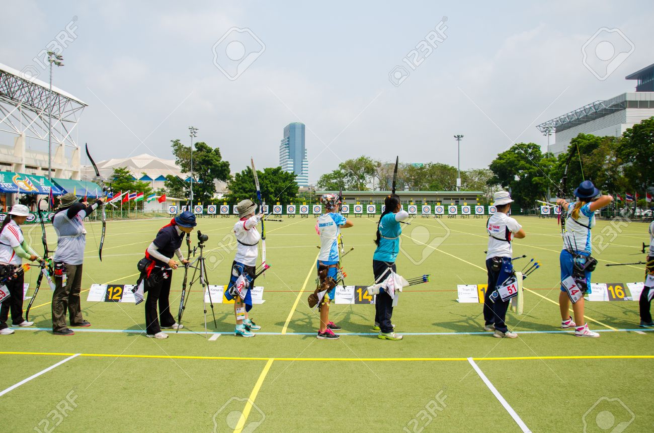 BANGKOK -MARCH 19: Unidentified archers in a row and shootin 2015 Asia Cup-World Ranking Tournament (stage II) at Hua Mak Sports Complex on March 19, 2015 in Bangkok, Thailand. - 37796918 BANGKOK -MARCH 19: Unidentified archers in a row and shootin 2015 Asia Cup-World Ranking Tournament (stage II) at Hua Mak Sports Complex on March 19, 2015 in Bangkok, Thailand. - 37796918