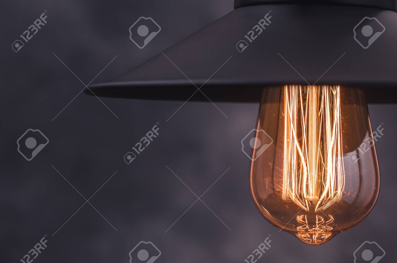 retro light lamp with edison light bulb from right border of stock