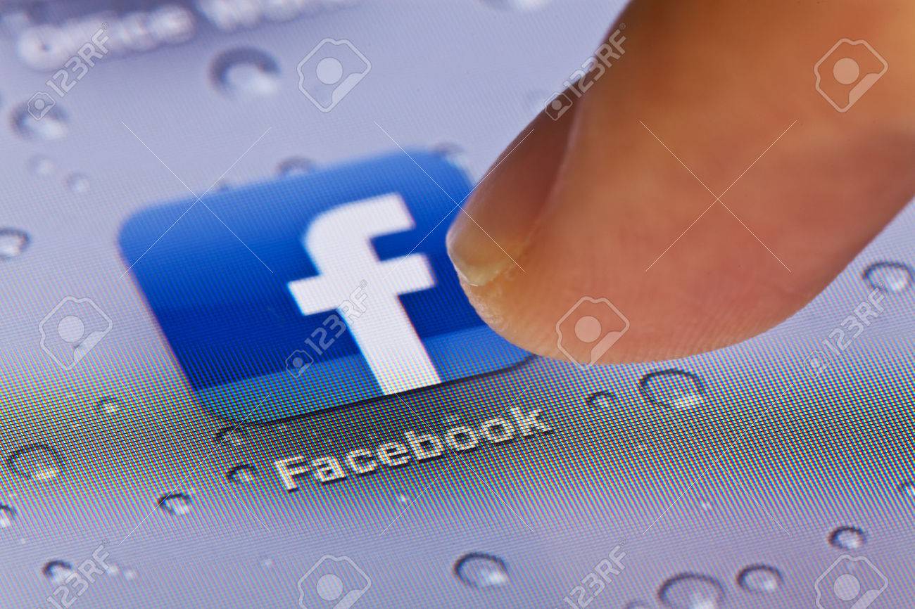 Hong Kong,China - July 2, 2011: Macro image of clicking the Facebook icon on an iPad screen - 42179335 Hong Kong,China - July 2, 2011: Macro image of clicking the Facebook icon on an iPad screen - 42179335