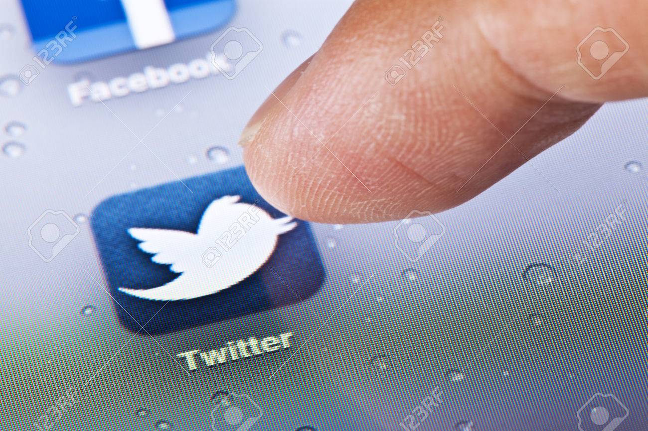 Hong Kong, China - July 23, 2011: Macro image of clicking the Twitter icon on an iPad screen - 42179367 Hong Kong, China - July 23, 2011: Macro image of clicking the Twitter icon on an iPad screen - 42179367