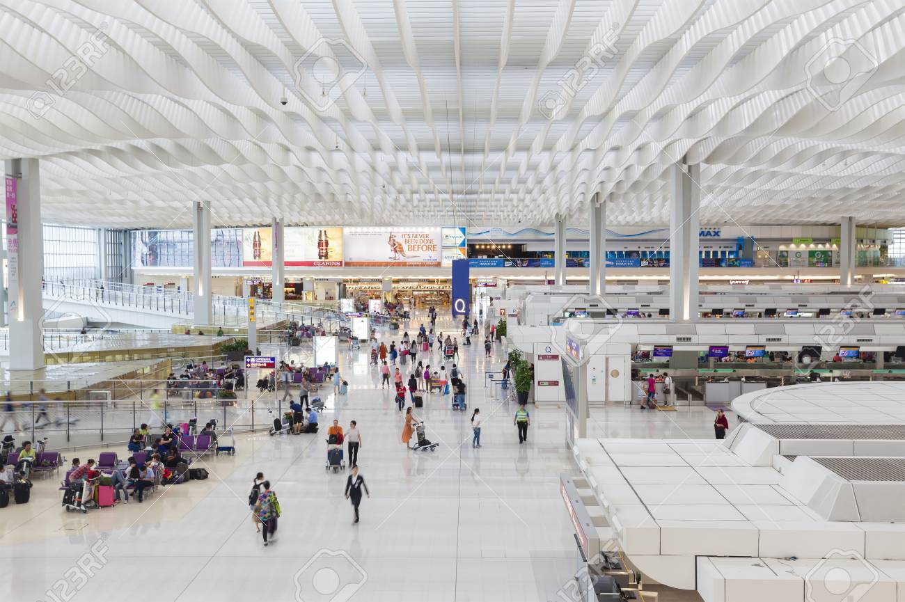 Hong Kong, China - Jun 23, 2015: Travellers in the departure hall of Hong Kong International Airport Terminal 2 - 43481909 Hong Kong, China - Jun 23, 2015: Travellers in the departure hall of Hong Kong International Airport Terminal 2 - 43481909