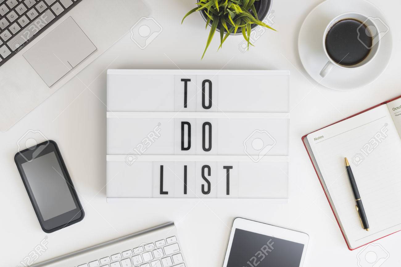 To do list words on office table with computer, coffee, notepad, smartphone and digital tablet - 53834815 To do list words on office table with computer, coffee, notepad, smartphone and digital tablet - 53834815