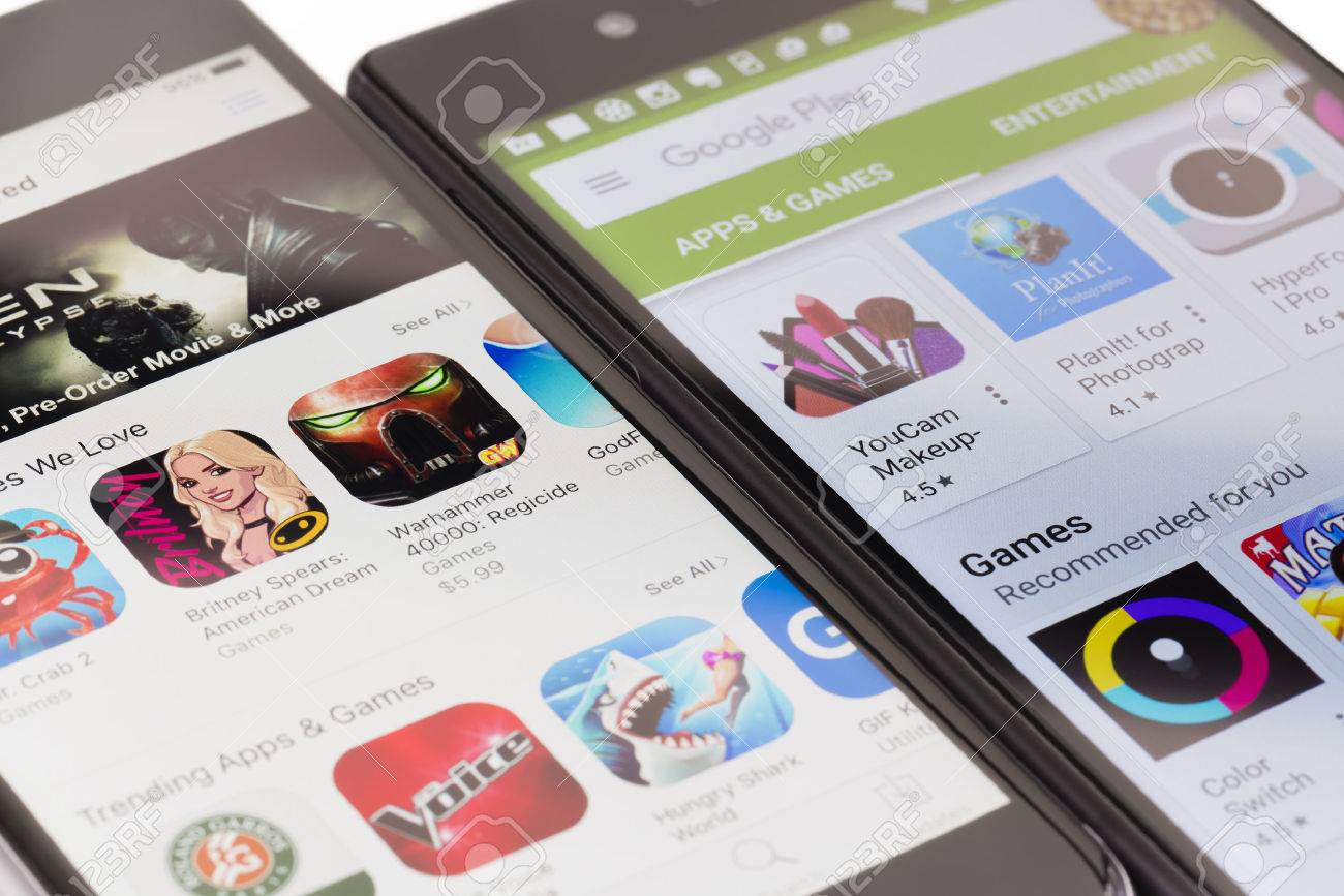 Melbourne, Australia - May 23, 2016: Close-up view of Google Play Store on Android smartphone and Apple's App Store on iPhone. Both stores allow users to download app, music, movies and TV shows. - 57064761 Melbourne, Australia - May 23, 2016: Close-up view of Google Play Store on Android smartphone and Apple's App Store on iPhone. Both stores allow users to download app, music, movies and TV shows. - 57064761