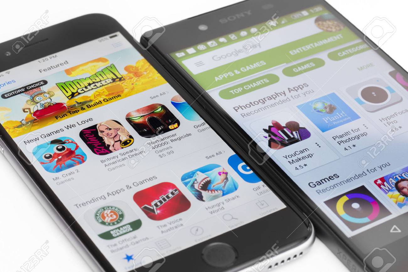 Melbourne, Australia - May 23, 2016: Close-up view of Google Play Store on Android smartphone and Apple's App Store on iPhone. Both stores allow users to download app, music, movies and TV shows. - 57457013 Melbourne, Australia - May 23, 2016: Close-up view of Google Play Store on Android smartphone and Apple's App Store on iPhone. Both stores allow users to download app, music, movies and TV shows. - 57457013