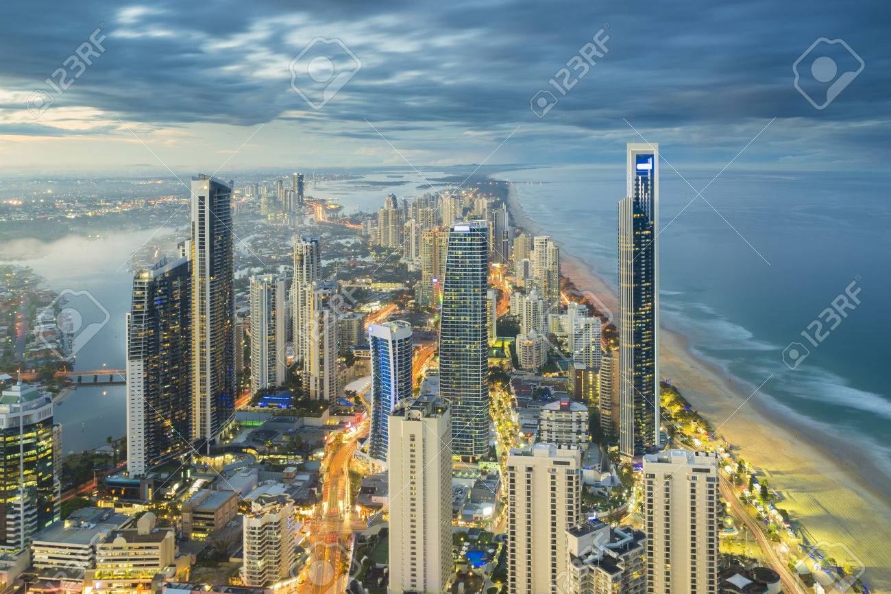 Aerial view of modern buildings with light trail at riverside at Gold Coast, Australia during sunset - 67102850 Aerial view of modern buildings with light trail at riverside at Gold Coast, Australia during sunset - 67102850