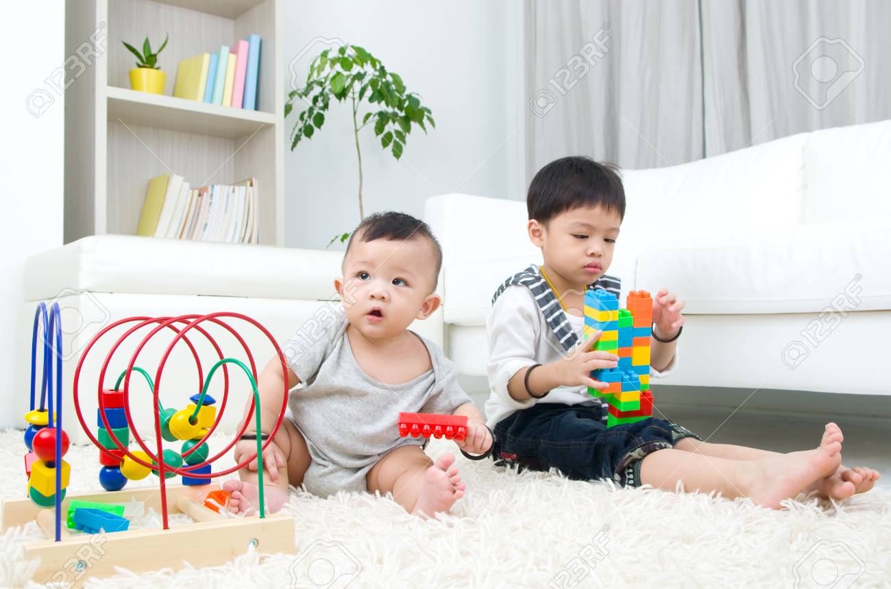 kids sitting toys