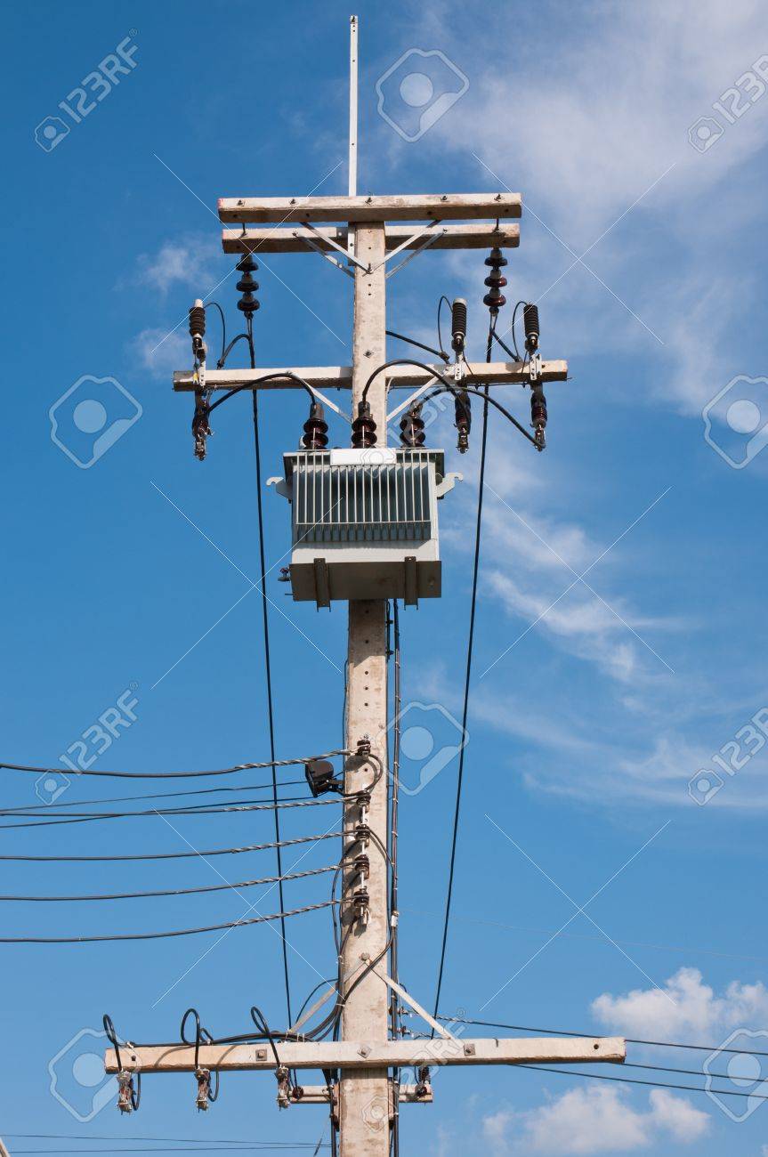 energy and technology electrical post by the road with power stock