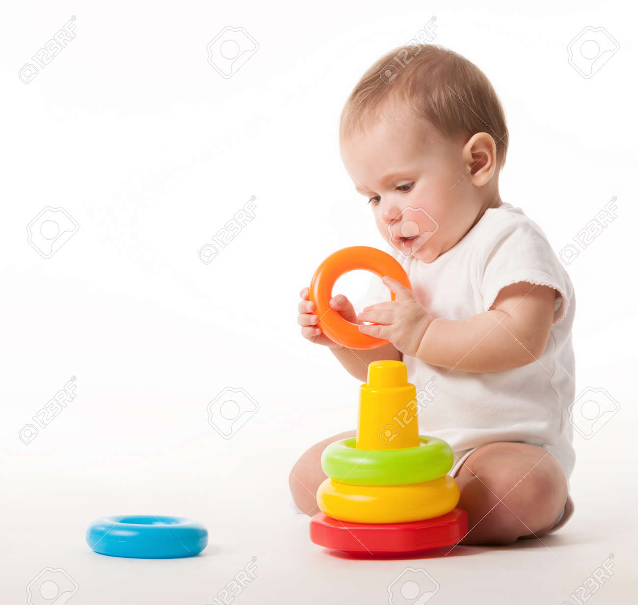 Charming cute baby in white overalls - 133807123 Charming cute baby in white overalls - 133807123