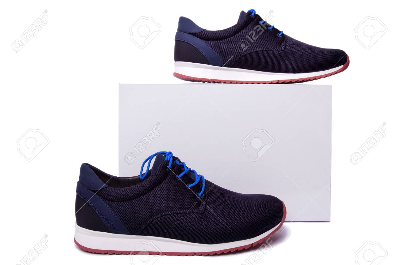black and blue mens sport shoes near the white box. Isolate on white. - 76156187 black and blue mens sport shoes near the white box. Isolate on white. - 76156187